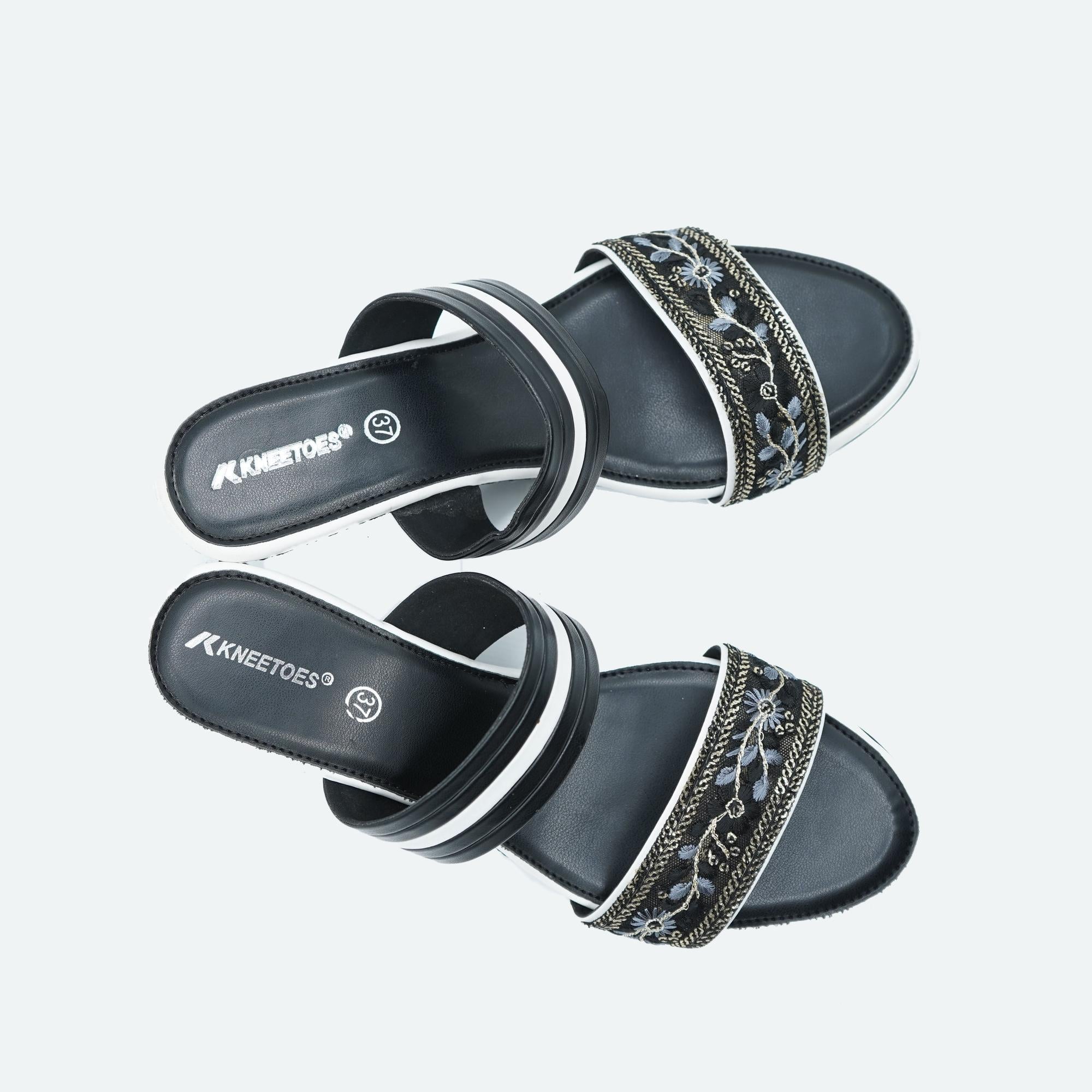 Bold Black Embroidered Wedge Sandals