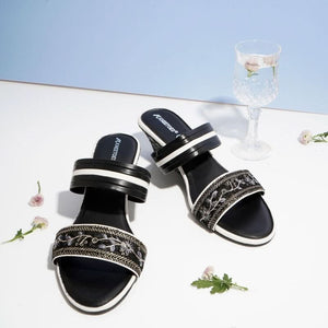 Bold Black Embroidered Wedge Sandals