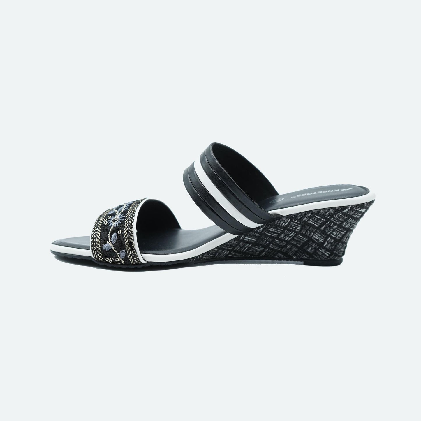 Bold Black Embroidered Wedge Sandals