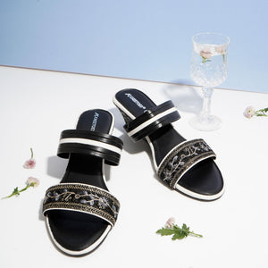 Bold Black Embroidered Wedge Sandals