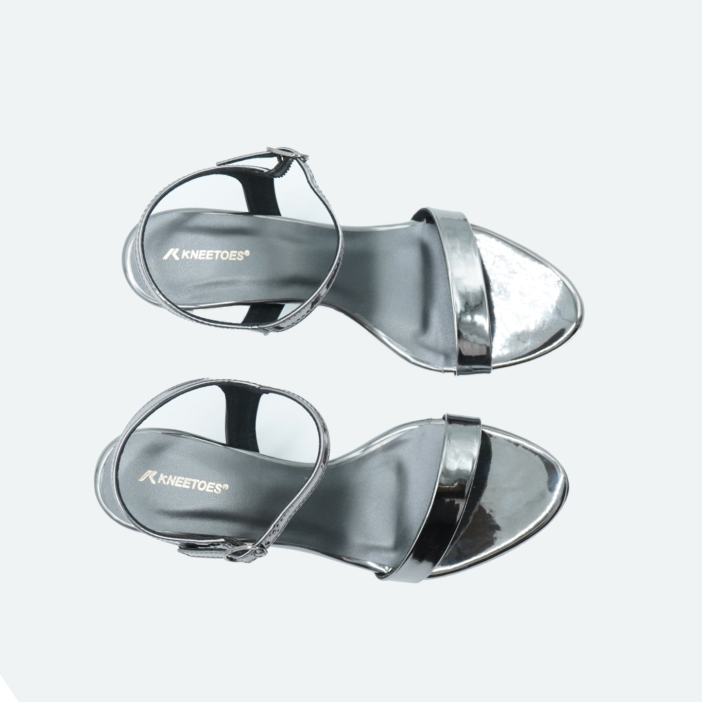 Sleek Shiny finish Gun metal Sandals featuring Design for Party wear