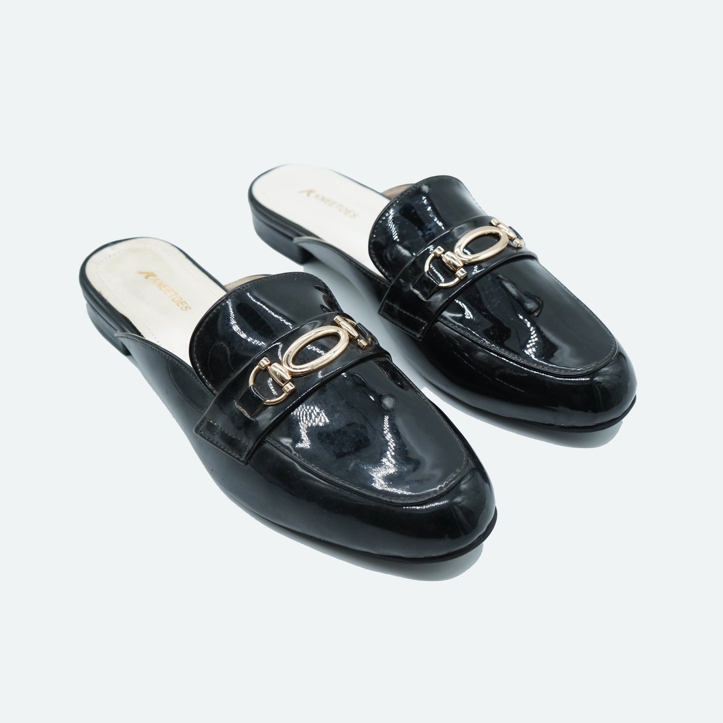 Glossy finish Black Slipper featuring Closed toe Design for Everyday Casuals